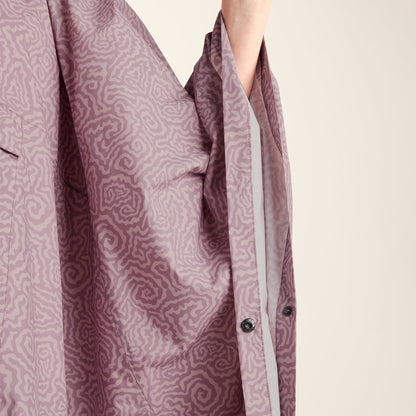Drench Unisex Waterproof Poncho - Dusky Pink Wiggle Print